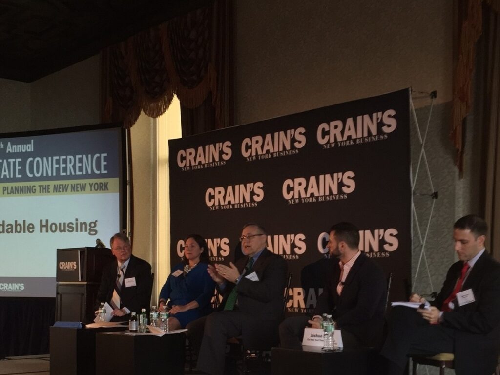 REBNY President Steve Spinola (center) with other panelists