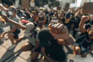 Black Lives Matter protesters with raised fists